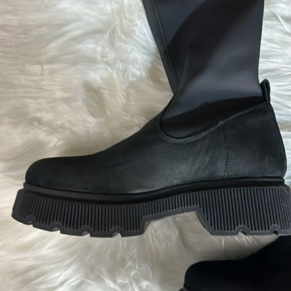 New and unworn tall boots